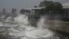 Waves crash along St. Pete Pier in St. Petersburg, Florida, as Hurricane Milton is expected to make landfall on Oct. 9, 2024.