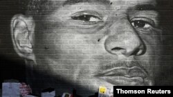 FILE PHOTO: Stand Up to Racism Demonstration at the Marcus Rashford mural after it was defaced following the Euro 2020 Final between Italy and England.