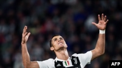 Cristiano Ronaldo, réagit lors du match entre la Juventus et Bologne, Italie, le 26 septembre 2018.