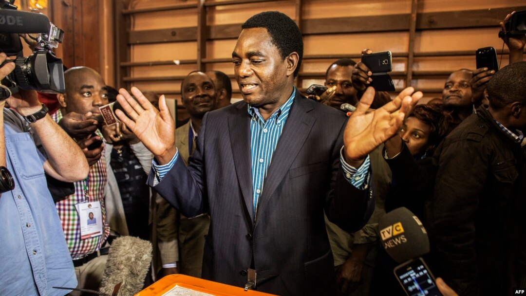 FILE - Hakainde Hichilema of the United Party for National Development casts his ballot in Lusaka's Kabulonga suburb, Jan. 20, 2015. Zambians chose Edgar Lungu to serve the remainder of the term of President Michael Sata, who died in October 2014. 