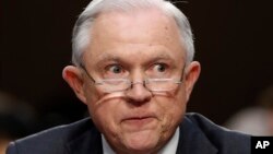 FILE - Attorney General Jeff Sessions testifies at a Senate committee hearing, June 13, 2017. Sessions said Thursday that 10 local jurisdictions had replied to the federal government with the 10 jurisdictions had written in with "alleged compliance information" regarding federal immigration law.