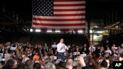 Republican presidential candidate, former Massachusetts Gov. Mitt Romney, speaks at a campaign rally in Colorado Springs, Colorado, February 4, 2012