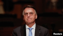Brazil’s former President Jair Bolsonaro attends an event at the Municipal Theatre in Sao Paulo, March 25, 2024.