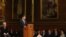 China's President Xi Jinping addresses members of parliament and peers in Parliament's Royal Gallery, in London, England, Oct. 20, 2015.