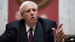 FILE - Governor Jim Justice delivers his first State of the State speech in Charleston, W.Va., Feb. 8, 2017.