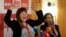 Irma Baralija greets supporters at her headquarters after local elections in Mostar, Bosnia, Sunday, Dec. 20, 2020.