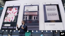 Google CEO Sundar Pichai talks about Google Lens and updates to the Google Assistant during the keynote address of the Google I/O conference in Mountain View, California, May 17, 2017. 