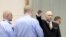Mass killer Anders Behring Breivik raises his arm in a Nazi salute as he enters the court room in Skien prison, Norway, March 15, 2016.