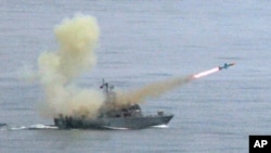 FILE - A Taiwanese navy frigate launches a 'Harpoon' surface-to-surface missile May 16, 2007, during the second day of the annual Hankuang military exercises off Ilan, central eastern coast of Taiwan.