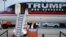 FILE - Republican presidential candidate Donald Trump holds a plane-side rally in Vienna, Ohio, Monday, March 14, 2016. The previously self-funded candidate will start asking for contributions to finance his campaign.