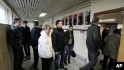 People queue to vote in the Icesave referendum in Reykjavik, Iceland, April 9, 2011