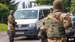 Ukrainian Security forces patrol the village of Bobrovyshche near the small Ukrainian town of Mukacheve to locate far-right nationalist organization Pravy Sektor (Right Sector) fighters on July 14, 2015.