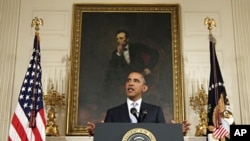 President Barack Obama speaks in the State Dining Room of the White House, Aug. 8, 2011