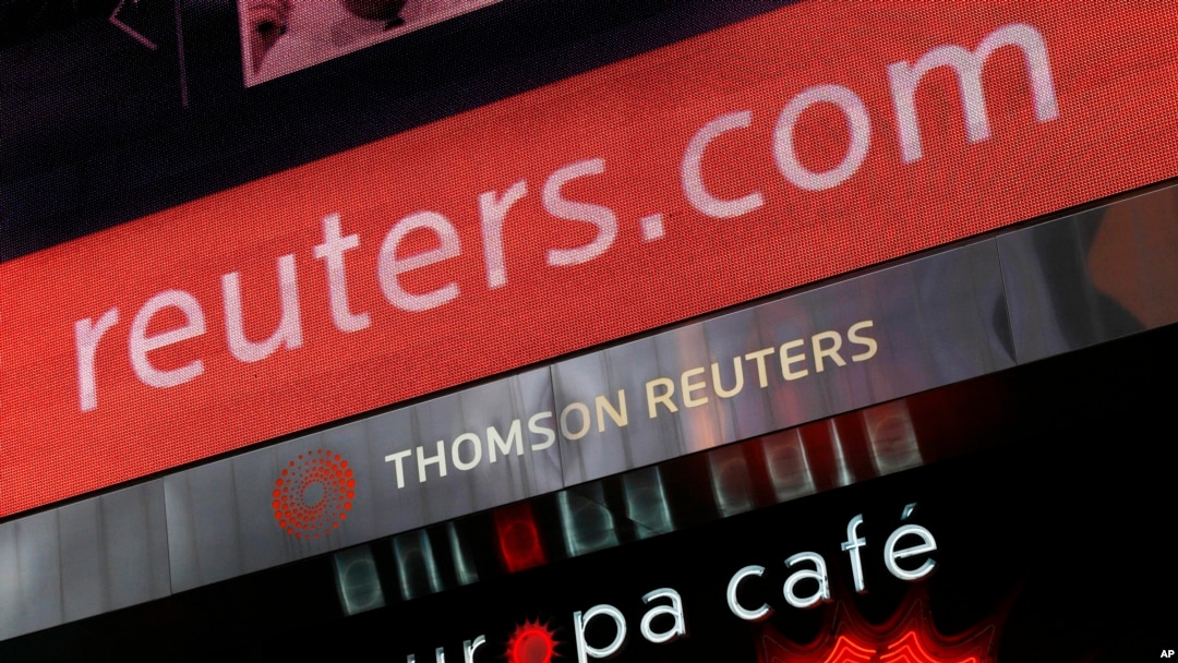 FILE - The logo of Thomson Reuters is shown on its building in New York, Jan. 19, 2010. 