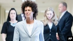 Andrea Constand walks to the courtroom during Bill Cosby's sexual assault trial at the Montgomery County Courthouse in Norristown, Pennsylvania, June 6, 2017. 