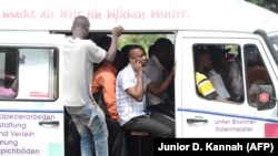 Un minibus dans les rues de Kinshasa, le 1er juillet 2013