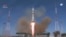 In this image made from video footage released by Roscosmos Space Agency, the Soyuz-2.1a rocket booster with Soyuz MS-17 space ship carrying a new crew to the ISS, blasts off at the Russian leased Baikonur cosmodrome, Kazakhstan, Oct. 14, 2020.