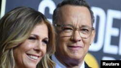 Tom Hanks dan istrinya, Rita Wilson, saat menghadiri penghargaan Golden Globe ke-77 di Beverly Hills, California, 5 Januari 2020. (Foto: Reuters)