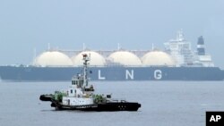 Tanker LNG, Al Hamra, tiba di Pelabuhan Yokohama, Jepang, 21 April 2014. (Foto:Dok) 