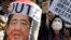 Protesters shout slogans during a rally against Japanese Prime Minister Shinzo Abe's policy about South Korean wartime sex slaves from the Japanese government in front of the Japanese Embassy in Seoul, South Korea, April 1, 2015. 