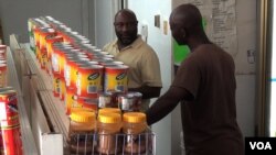 Stephen Joe in his African food store in Dallas, Texas, Oct. 1, 2014. (VOA \ G. Flakus)