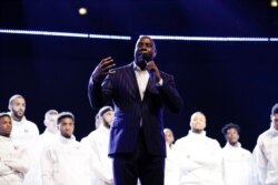 Magic Johnson speaks during a tribute to former NBA All-Star Kobe Bryant and his daughter Gianna who were killed in a helicopter crash on Jan. 26, 2020, before the NBA All-Star basketball game Sunday, Feb. 16, 2020, in Chicago.