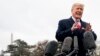 President Donald Trump speaks to members of the media before boarding Marine One on the South Lawn of the White House in Washington, Nov. 26, 2018, for a short trip to Andrews Air Force Base, Maryland, and then on to Mississippi for rallies.