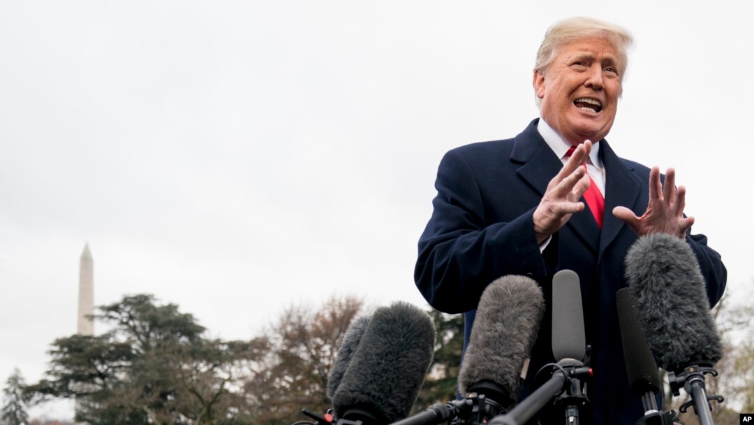President Donald Trump speaks to members of the media before boarding Marine One on the South Lawn of the White House in Washington, Nov. 26, 2018, for a short trip to Andrews Air Force Base, Maryland, and then on to Mississippi for rallies.