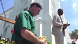 Pastors hold prayer outside Emanuel AME Church, Charleston, June 20, 2015.
