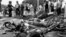 The bodies of dead civilians lie among mangled bicycles near Beijing's Tiananmen Square, June 4, 1989. 