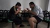 Obese patients take their lunch at the Aimin Fat Reduction Hospital in Tianjin, China, Thursday, July 24, 2008. The hospital uses a combination of diet, exercise and traditional Chinese acupuncture to treat obesity that is on the rise as living…
