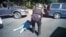 This image made from video provided by the Charlotte-Mecklenburg Police Department, Sept. 24, 2016, shows Keith Scott on the ground as police approach him in Charlotte, N.C., on Sept. 20, 2016. 
