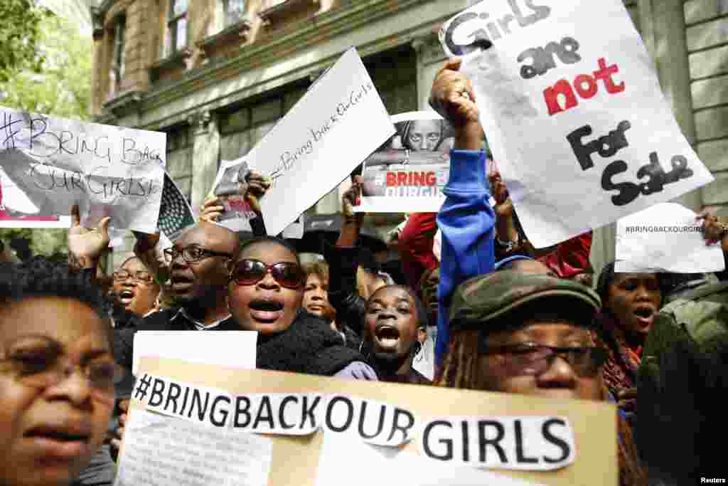 Protesters demonstrate against the kidnapping of the schoolgirls in Nigeria, outside the Nigerian Embassy, London May 9, 2014.