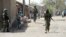 Nigerian soldiers are seen patrolling a town in the north-eastern state of Borno in this April 30, 2013, file photo.