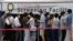 People queue in line to wait for the coronavirus testing at a Public Health Center in Seoul, South Korea, July 9, 2021.