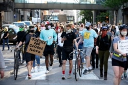 Hundreds of protesters marched through downtown Minneapolis after a protest at the Hennepin County Government Center Thursday, May 28, 2020.