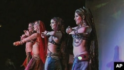 Some of the troupe of 'Belly Dancing Super Stars' give one of their unique performances as they tour the world promoting this form of the ancient dance, Nov 2010