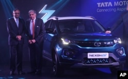 Tata Sons chairman Natarajan Chandrasekaran, left, and Tata group's former chairman Ratan Tata pose during the launch of electric SUV Nexon EV in Mumbai, India, Jan. 28, 2020.