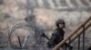A South Korean soldier walks up the stairs at an observation post, near the demilitarized zone (DMZ) which separates the two Koreas, in Paju, north of Seoul, March 12, 2013. 