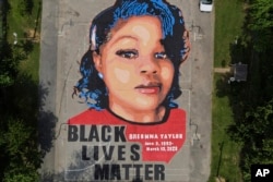 FILE - An aerial photo shows a ground mural depicting Breonna Taylor at Chambers Park in Annapolis, Maryland, on July 6, 2020.