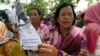 Farmers from some of provinces stage a protest rally near prime minister's residence in Phnom Penh, Cambodia, Monday, July 22, 2019. (AP Photo/Heng Sinith)