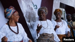 FILE—Women perform a traditional dance during the opening event of the African Union's conference on reparations in Accra, Ghana November 14, 2023.