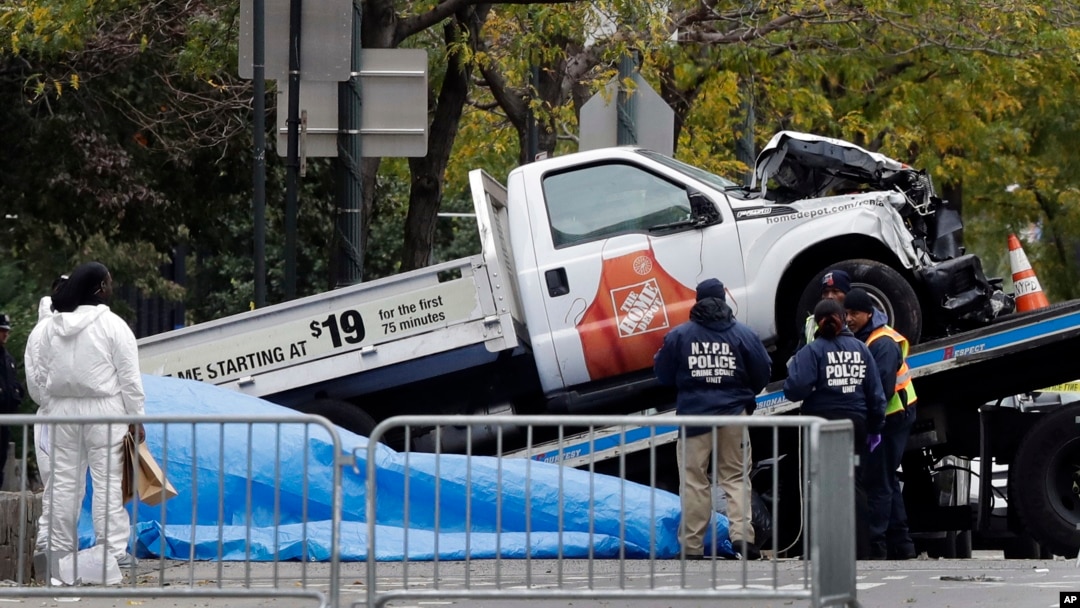 The Home Depot truck used in the bike path attack is removed from the crime scene, Nov. 1, 2017, in New York. 
