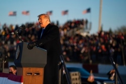 President Donald Trump speaks during a campaign rally at MotorSports Management Company, in West Salem, Wis., Oct. 27, 2020.