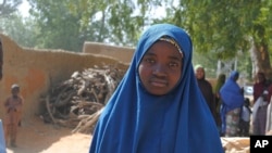 Aishat Alhaji , one of the kidnapped girls from the Government Girls Science and Technical College Dapchi who was freed, is photographed after her release, in Dapchi, Nigeria, March. 21, 2018.