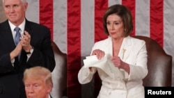 Speaker of the House Nancy Pelosi rips up a copy of U.S. President Donald Trump's speech after his State of the Union address to a joint session of the U.S. Congress in the House Chamber of the Capitol in Washington, Feb. 4, 2020.