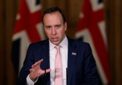 FILE - Britain's Health Secretary Matt Hancock speaks at a press conference inside 10 Downing Street on further restrictions to be put in place due to the ongoing coronavirus pandemic in London, Dec. 23, 2020.