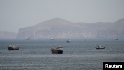 FILE PHOTO: Ships and boats in the Strait of Hormuz