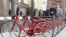 Bicycles with the Bank of Moscow log stand ready to rent in central Moscow, May 27, 2013.