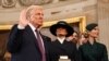 U.S. President-elect Donald Trump takes the oath of office as Melania Trump, Ivanka Trump, Donald Trump Jr. and Eric Trump look on during inauguration ceremonies in the Rotunda of the U.S. Capitol on January 20, 2025 in Washington, DC. Donald Trump takes 